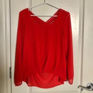 Red blouse with cross cross back